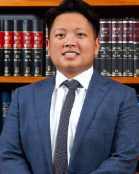 Our Team - Experienced lawyer in a professional setting at Tan And Tan Lawyers.